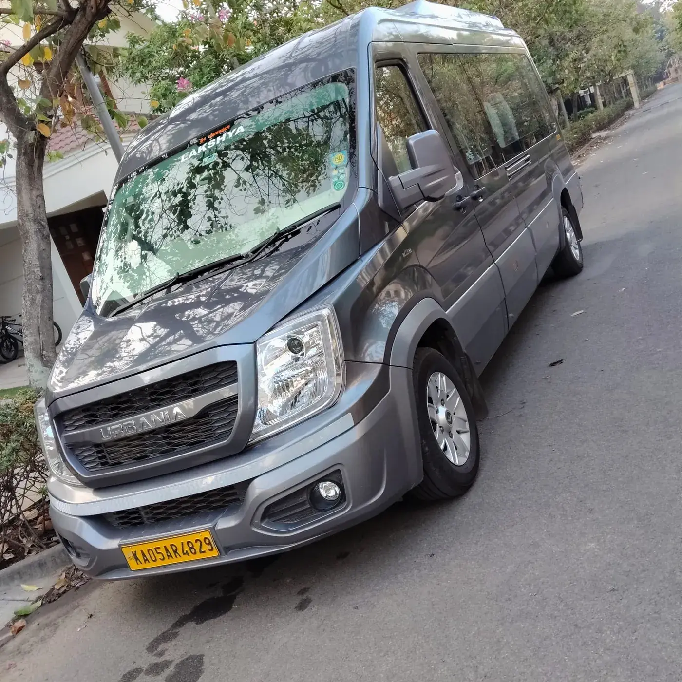 Front three-quarter view of a grey Force Urbania on a Bengaluru street